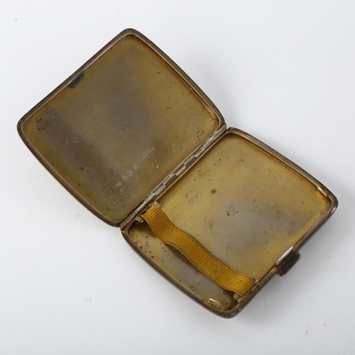 1566 - A George V silver cigarette case, curved rectangular form with allover engine turned decoration and ... 