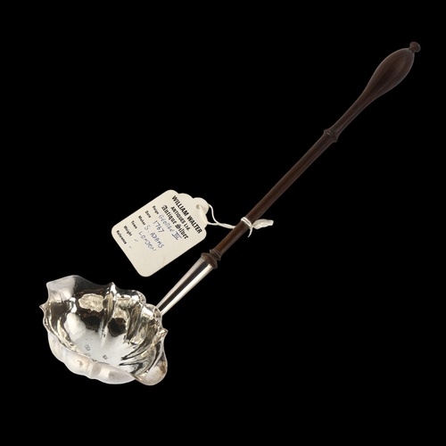 1572 - A George III silver toddy ladle, with finely turned rosewood handle, by S Adams, hallmarks London 17... 