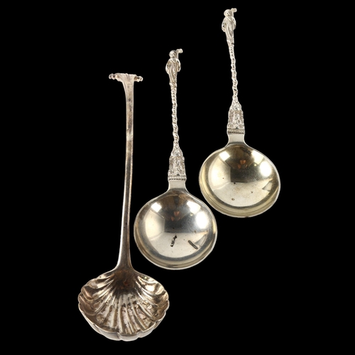 1583 - An Antique Irish silver shell sauce ladle, and a pair of silver Apostle spoons, ladle length 20cm, 5... 