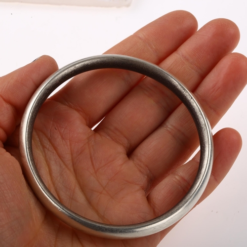 1382 - HANS HANSEN - a Danish modernist sterling silver slave bangle, band width 8.2mm, internal circumfere... 