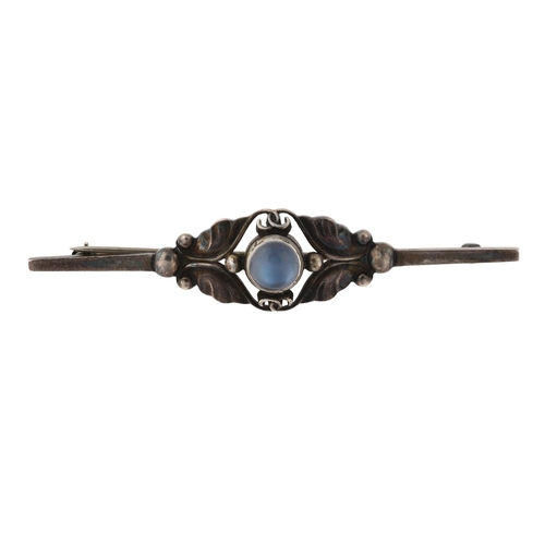 1383 - GEORG JENSEN - an Art Nouveau Danish sterling silver moonstone floral bar brooch, model no. 224B, br... 