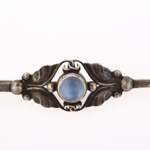 1383 - GEORG JENSEN - an Art Nouveau Danish sterling silver moonstone floral bar brooch, model no. 224B, br... 