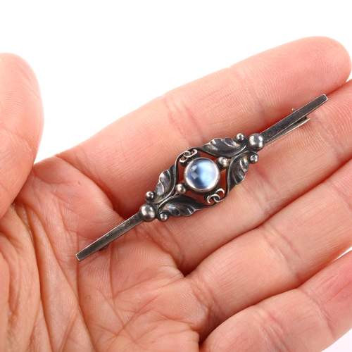 1383 - GEORG JENSEN - an Art Nouveau Danish sterling silver moonstone floral bar brooch, model no. 224B, br... 