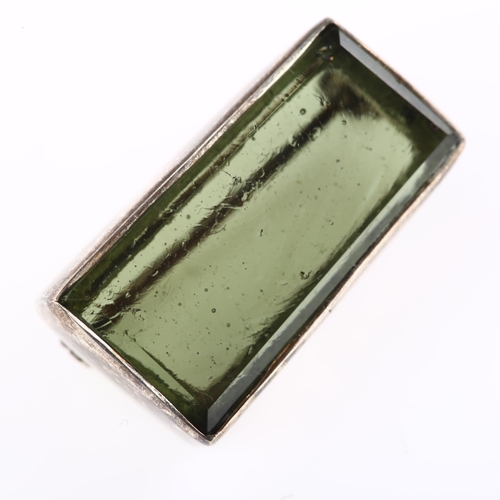 1384 - A natural moldavite green glass brooch, unmarked white metal settings, brooch length 23.1mm, 6.7g