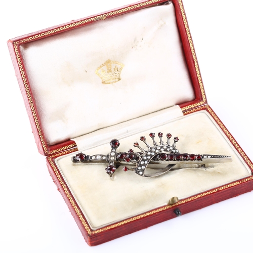 1387 - A large Continental silver garnet and pearl crown and sword brooch, brooch length 76.6mm, 9.8g, in f... 