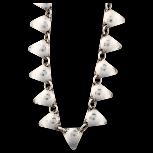 1393 - CHRISTIAN VEILSKOV - a Danish modernist silver fringe necklace, convex triangular links, necklace le... 