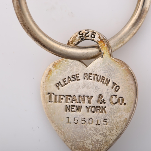 1398 - TIFFANY & CO - a sterling silver Return To Tiffany heart tag keyring, serial no. 155015, 10.4g