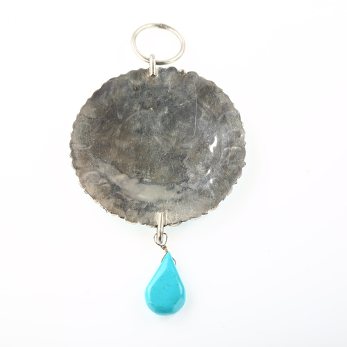 1406 - A large Native American Navajo turquoise drop pendant, unmarked silver closed-back settings, pendant... 