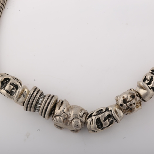 1410 - A silver snake link charm bracelet, with 6 silver charms, bracelet length 18cm, 29.1g