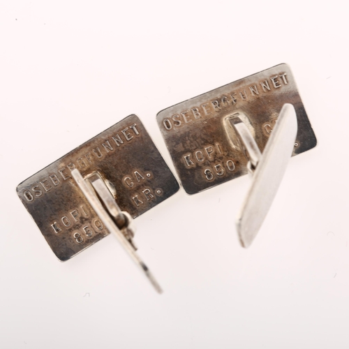 1412 - DAVID ANDERSEN - a pair of Danish sterling silver Viking Revival cufflinks, panel length 21mm, 14.4g