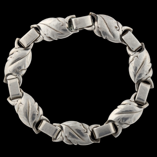 1425 - EILER & MARLOE - a Danish Art Nouveau silver floral panel bracelet, length 18cm, 28.9g