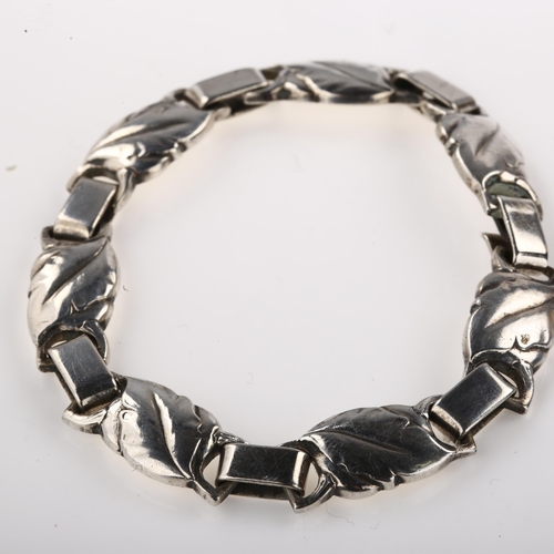 1425 - EILER & MARLOE - a Danish Art Nouveau silver floral panel bracelet, length 18cm, 28.9g