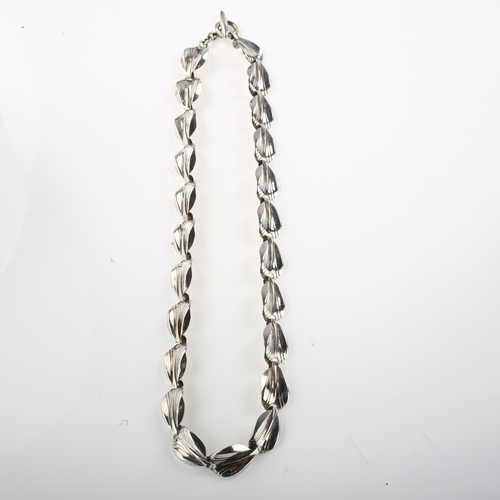 1426 - HERMANN SIERSBOL - a Danish modernist sterling silver leaf panel necklace, length 39cm, 22g