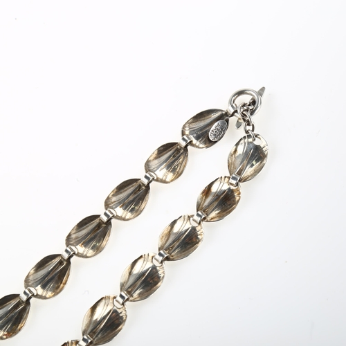 1426 - HERMANN SIERSBOL - a Danish modernist sterling silver leaf panel necklace, length 39cm, 22g