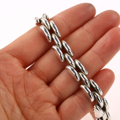 1430 - A Continental 900 silver gatelink bracelet, length 21cm, 24.7g