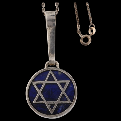 1433 - F R BINDER & CO - a Danish modernist lapis lazuli Star of David pendant necklace, unmarked silver se... 