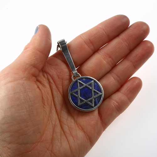 1433 - F R BINDER & CO - a Danish modernist lapis lazuli Star of David pendant necklace, unmarked silver se... 