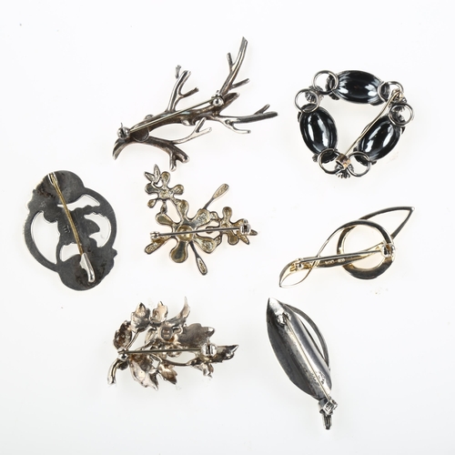 1460 - 7 Scandinavian silver floral brooches, maker's include John Lauridsen, largest length 55.8mm, 46.5g ... 