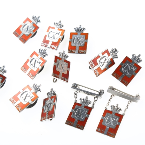 1476 - GEORG JENSEN - 12 Danish sterling silver and red enamel Kingmark badges and brooches, height 23.8mm,... 