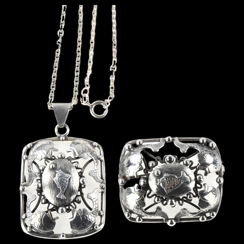 1477 - NIELS ANKER LETH JENSEN - a Danish Art Nouveau silver fish jewellery set, comprising pendant necklac... 