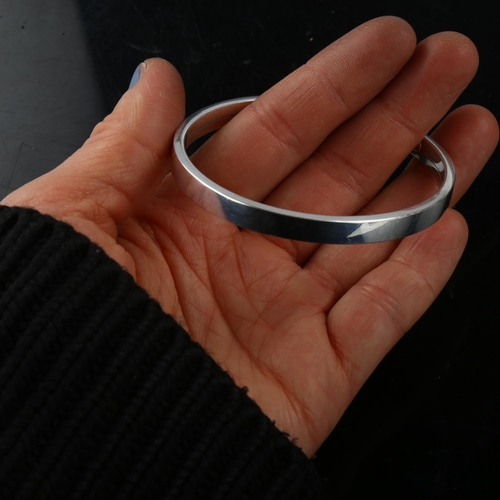 1478 - PER E LANGE - a Danish modernist sterling silver torque bangle, band width 6mm, internal circumferen... 