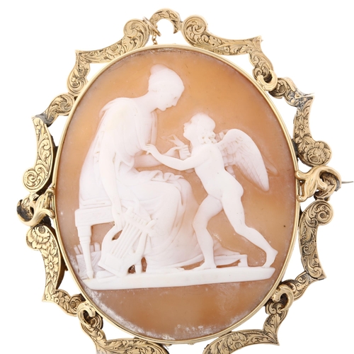 1348 - A large Victorian shell cameo brooch, relief carved depicting Erato and Eros, in unmarked gold flora... 