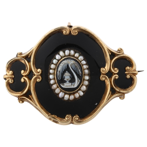 1349 - A Victorian cameo split pearl and black enamel mourning brooch, unmarked gold foliate settings with ... 