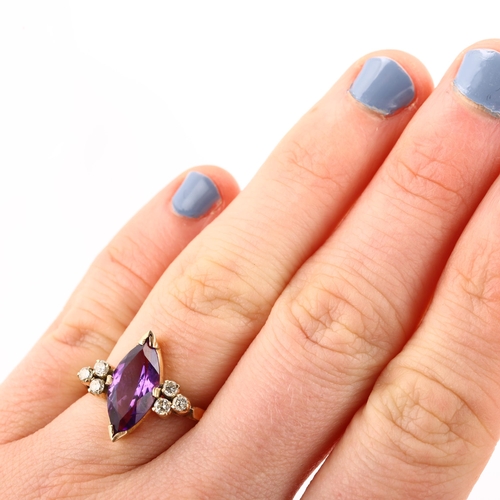 1359 - A 14ct gold amethyst and diamond dress ring, set with marquise amethyst and modern round brilliant-c... 