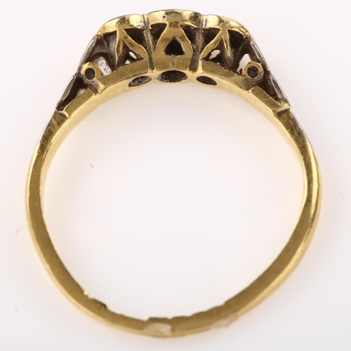 1360 - A mid-20th century 18ct gold three stone diamond ring, illusion set with single-cut diamonds and pla... 