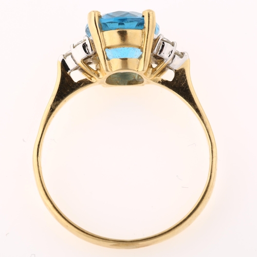 1370 - A 14ct gold blue topaz and diamond dress ring, set with oval mixed-cut topaz and modern round brilli... 