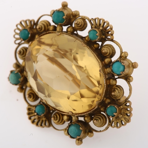 1373 - A Victorian citrine and turquoise brooch, unmarked yellow metal settings with cannetille wirework de... 