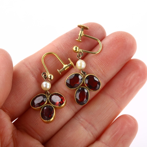 1376 - A pair of 9ct gold garnet and pearl drop earrings, with screw fittings, earring height 28.5mm, 4.6g