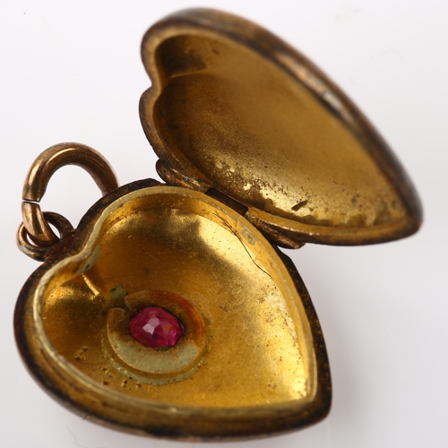 1379 - A Victorian 15ct gold ruby heart locket pendant, pendant height 27.5mm, 3.7g