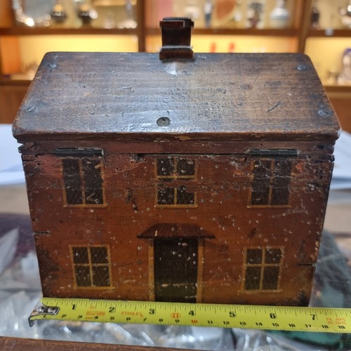 238 - A late 18th/early 19th century Regency Folk Art Cottage tea caddy, with lifting roof and secret draw... 