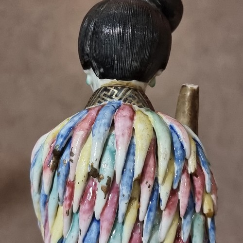 197 - A 19th century Chinese porcelain figure with fine enamel decoration, height 25cm