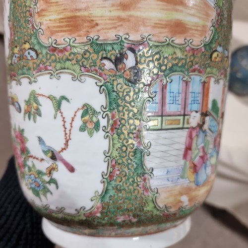 22 - A Chinese Canton famille rose ceramic rouleau vase, with hand painted and enamelled figures in court... 