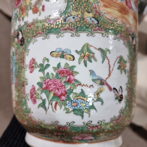 22 - A Chinese Canton famille rose ceramic rouleau vase, with hand painted and enamelled figures in court... 