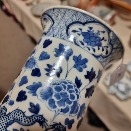 24 - A Chinese blue and white 'Dragon' sleeve vase, with hand painted dragon and chrysanthemum decoration... 