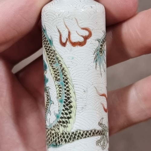 25 - A Chinese famille verte miniature 'Dragon' porcelain scent bottle, depicting dragon chasing a flamin... 