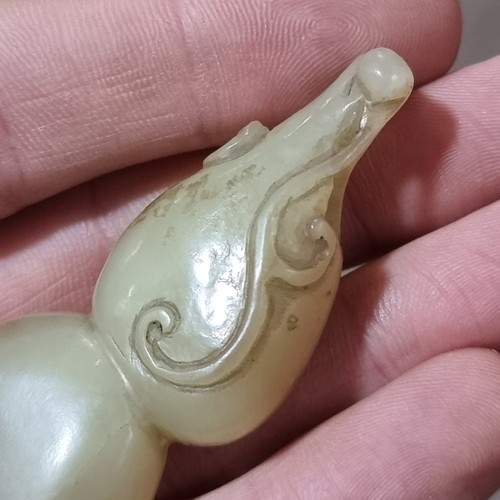 179 - A Chinese carved jade double gourd snuff bottle, length 7cm