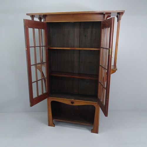 2000 - An Arts & Crafts / Art Nouveau display bookcase cabinet in the manner of Liberty & Co. 140x192x36cm.