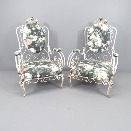 2010 - A pair of mid-century French wrought-iron conservatory chairs, with scrolled arms, in the manner of ... 