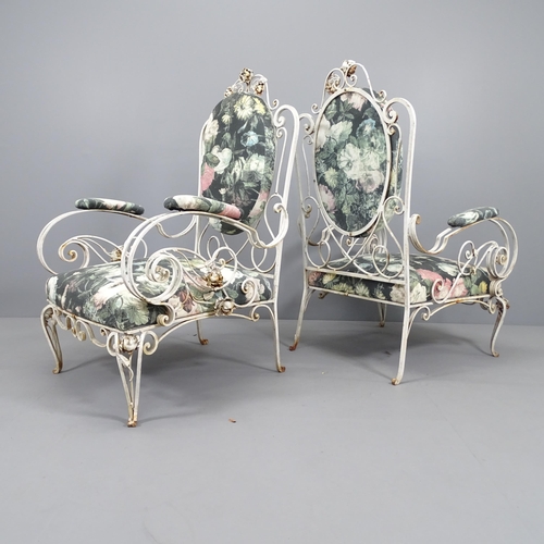 2010 - A pair of mid-century French wrought-iron conservatory chairs, with scrolled arms, in the manner of ... 