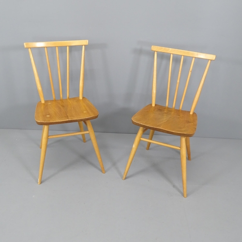 2011 - A pair of mid-century Ercol elm and beech chairs.