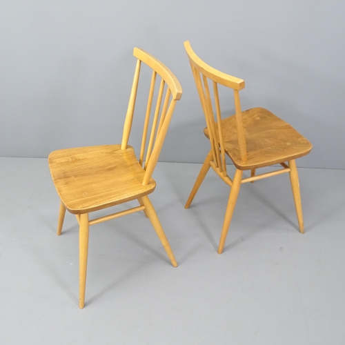 2011 - A pair of mid-century Ercol elm and beech chairs.