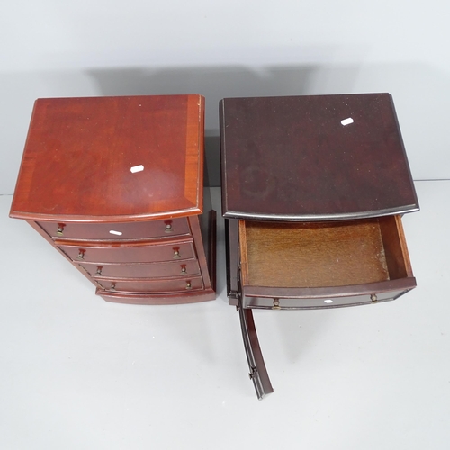 2015 - A pair of modern mahogany pot cupboards, with two drawers above single cupboard door. 38x68x32cm.