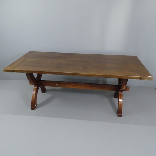 2016 - A late 20th century oak trestle dining table. 194x75x87cm