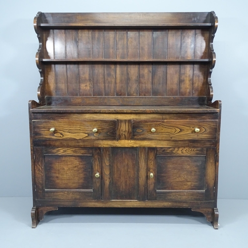 2020 - Greenings of Oxford, an oak dresser by Ambrose Heal for Heals, circa 1910. 132x156x40cm.