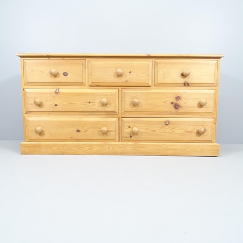 2021 - A modern pine chest of three short and four long drawers. 150x75x45cm