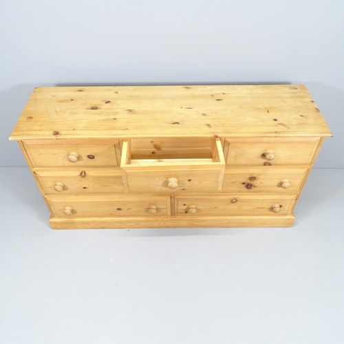 2021 - A modern pine chest of three short and four long drawers. 150x75x45cm